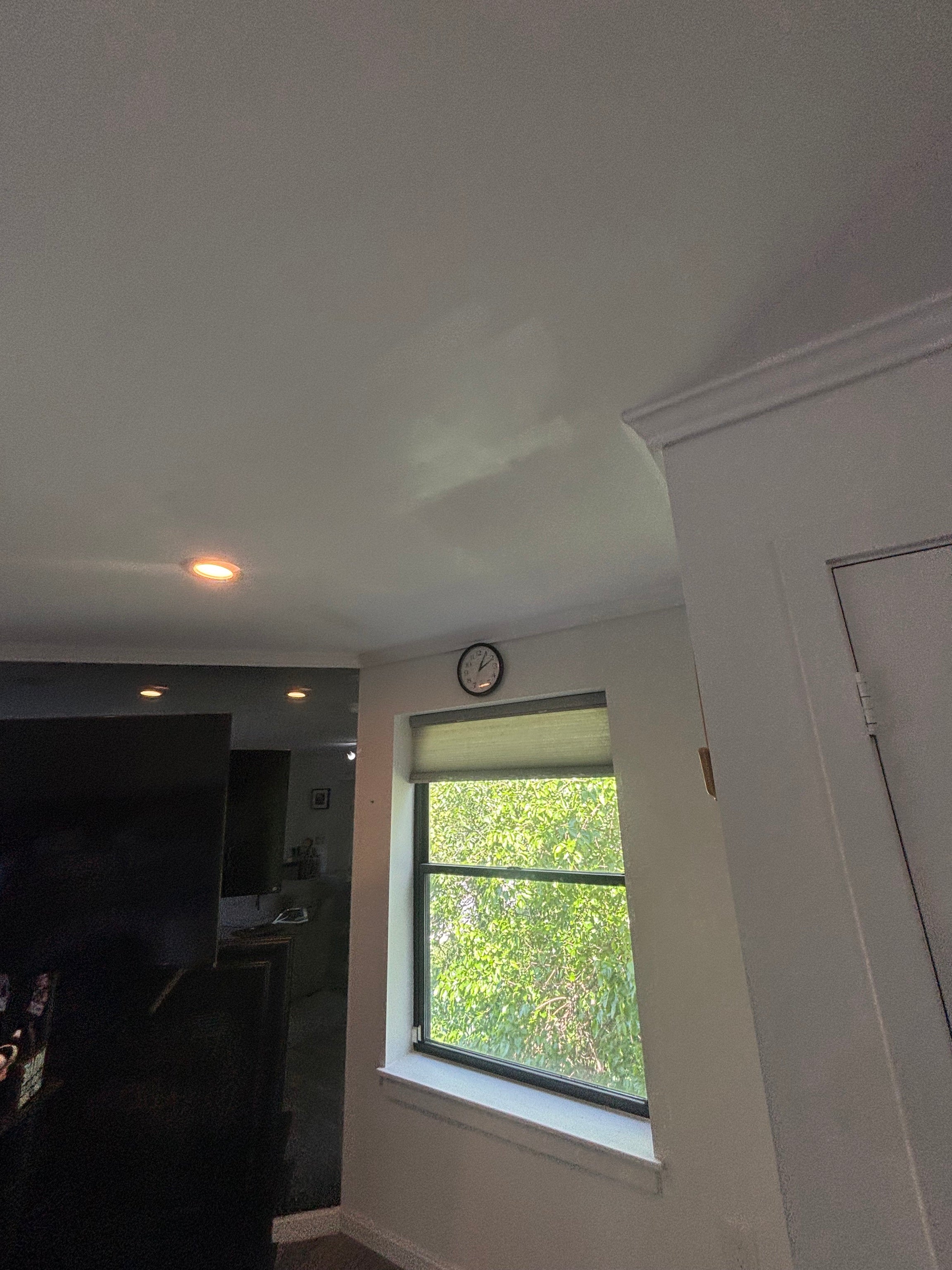 Ceiling after drywall repair and finishing