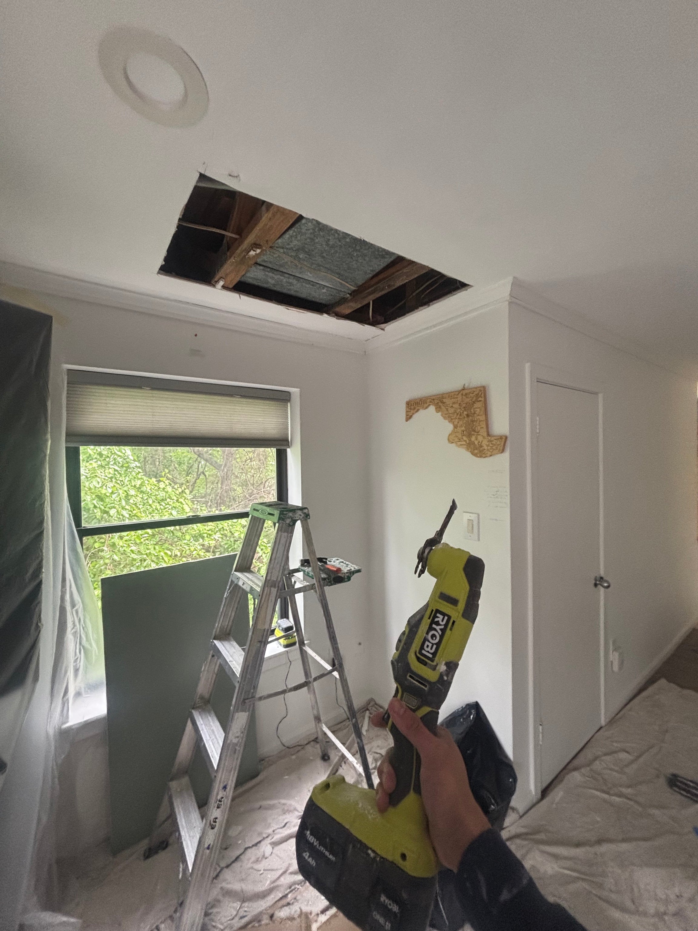 Ceiling opening before drywall repair